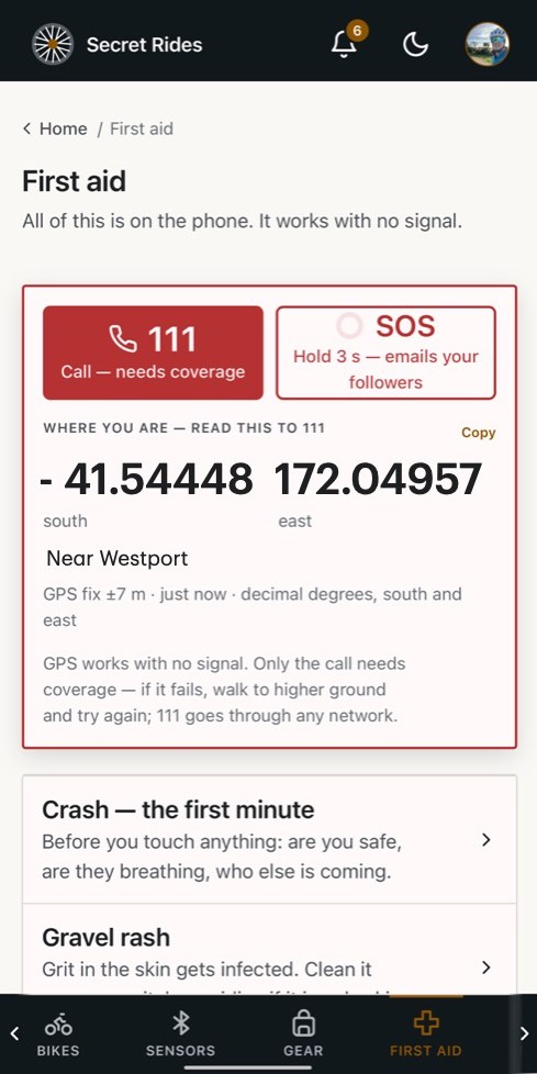 First aid on the phone: Call 111 and hold-to-send SOS buttons, your coordinates to read to 111 (41.54448 south, 172.04957 east, near Westport), then numbered guides starting with Crash — the first minute and Gravel rash